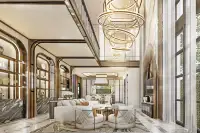 4 Bedroom House for Sale at Arcade Autograph grand double-height living room with gold ring chandelier and marble floors