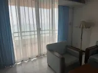 2 Bedroom Condo for Rent at Rama Harbour View balcony view with sheer curtains overlooking the ocean