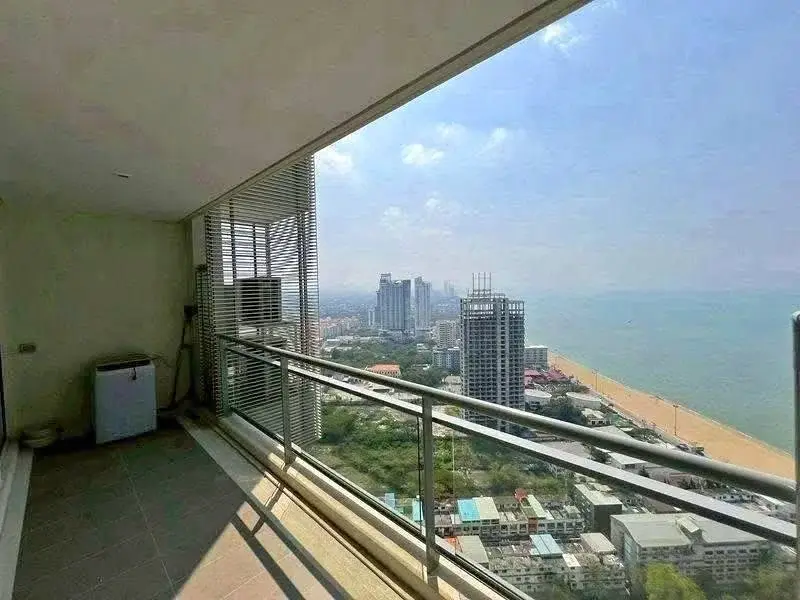1 Bedroom Condo for Sale at Reflection Jomtien Beach high-floor balcony with panoramic sea and city view