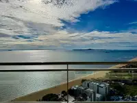 2 Bedroom Condo for Sale at Reflection Jomtien Beach ocean view from glass balcony overlooking Jomtien beach