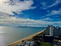 2 Bedroom Condo for Sale at Reflection Jomtien Beach stunning coastal view with blue sea and sandy beach