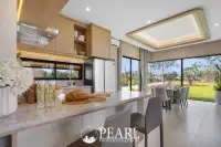 3 Bedroom House for Sale in Baan Pattaya 7 (Ascent) modern kitchen with island