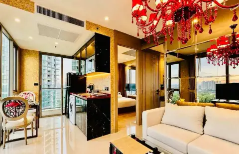 1 Bedroom Condo for Rent at Riviera Ocean Drive open-plan kitchen, lounge area, and dining chair with high-rise views