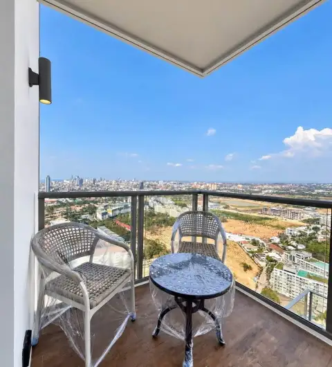 1 Bedroom Condo for Rent at Riviera Ocean Drive balcony seating area with panoramic city skyline view