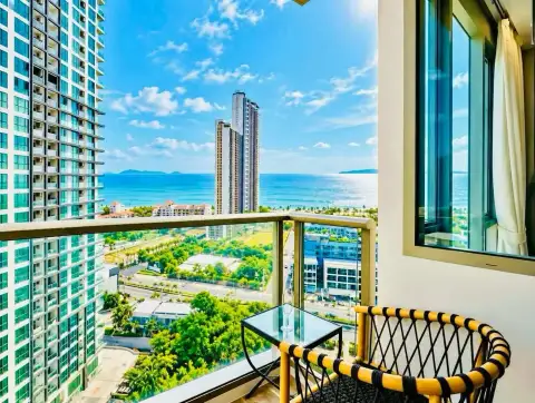 1 Bedroom Condo for Rent at Riviera Ocean Drive private balcony with panoramic sea view and seating area