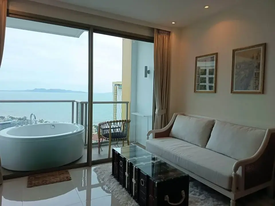 1 Bedroom Condo for Rent at Riviera Ocean Drive living room with balcony tub and sea view