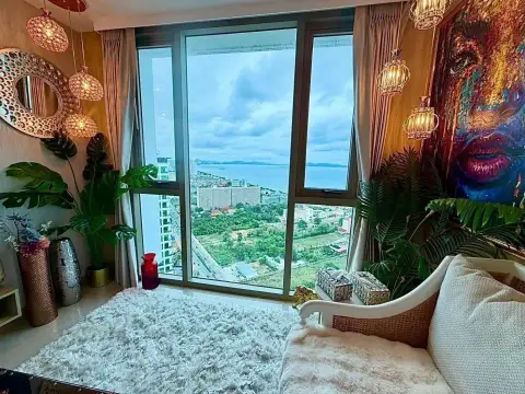 2 Bedroom Condo for Sale at Riviera Ocean Drive floor-to-ceiling window showing coastal city and ocean skyline view