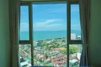 2 Bedroom Condo for Sale at Riviera Ocean Drive bedroom window view of ocean and city rooftops