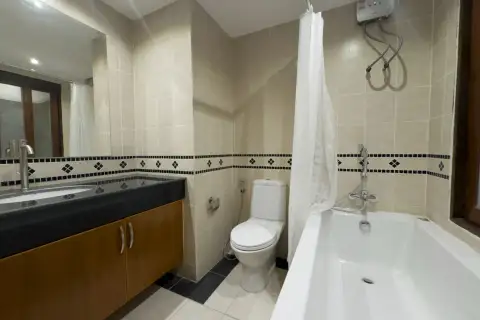 2 Bedroom Condo for Rent at Royal Hill Resort bathroom with bathtub, shower curtain and vanity sink