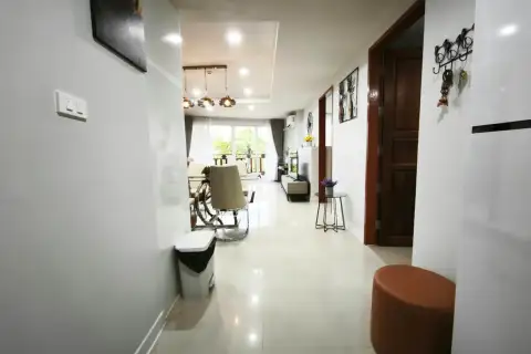 2 Bedroom Condo for Rent at Royal Hill Resort hallway view toward dining room and bedroom entrance