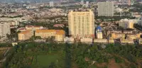 1 Bedroom Condo for Sale at Royal Hill Resort aerial view of high-rise building and surrounding Pattaya cityscape