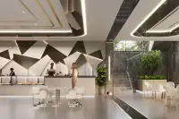 3 Bedroom Condo for Sale at Grand Solaire Noble bedroom with black marble accent wall and mirrored closet
