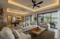 3 Bedroom House for Sale at Zensiri Lakeside Pool Villas open-plan living room with LED ceiling, ceiling fan, and pool view