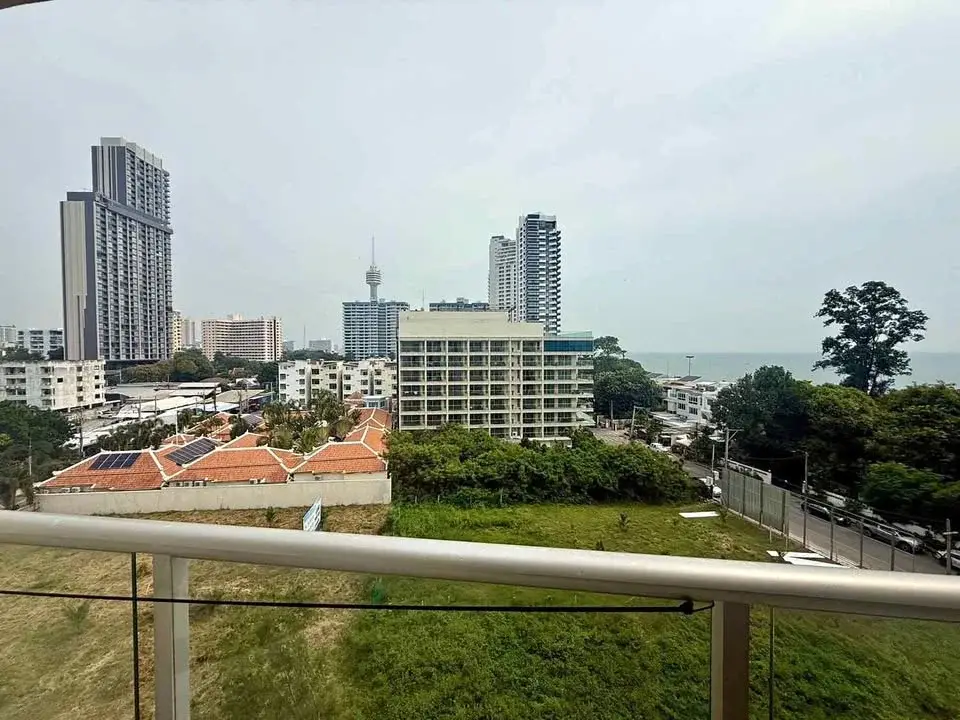 Studio Condo for Sale at Sands Condominium balcony view of Pattaya skyline, high-rises and sea in distance