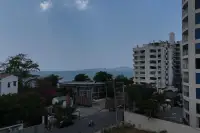 1 Bedroom Condo for Sale at Sea Sky By Sand sea view from balcony with Pattaya skyline and coastline