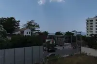 1 Bedroom Condo for Sale at Sea Sky By Sand street view with sea glimpse and surrounding buildings