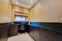 4 Bedroom House for Sale & Rent at Sedona Villas 1 home office nook with built-in desk and dark wood cabinetry