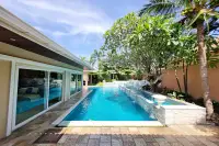 4 Bedroom House for Sale & Rent at Sedona Villas 1 lap pool with water features and palm tree landscaping
