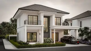 Serene Home: Top-down aerial view of a modern white house with a dark roof, black car in driveway, and green trees.