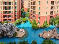 2 Bedroom Condo for Sale at Seven Seas Condo Resort aerial view of lagoon pool with rock features and lush gardens
