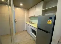 1 Bedroom Condo for Rent at Seven Seas Condo Resort compact kitchen with fridge, sink and cabinetry