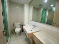 1 Bedroom Condo for Rent at Seven Seas Condo Resort bathroom with sink, mirror and toilet