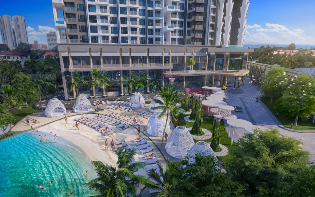 Copacabana Coral Reef infinity pool on a high floor, overlooking a city skyline under a blue sky.