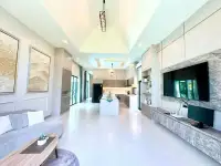 3 Bedroom House for Sale & Rent in Mabprachan living area with wall-mounted TV and marble console