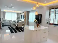 4 Bedroom House for Sale in Mabprachan modern kitchen island with pendant lights and dining view