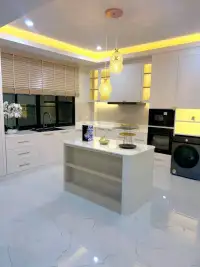 4 Bedroom House for Sale in Mabprachan white kitchen with central island and built-in appliances