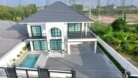 4 Bedroom House for Sale in Mabprachan aerial view of villa with private pool and driveway