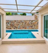 3 Bedroom House for Sale at Silk Road Place covered private pool with blue tile steps and stone accent wall