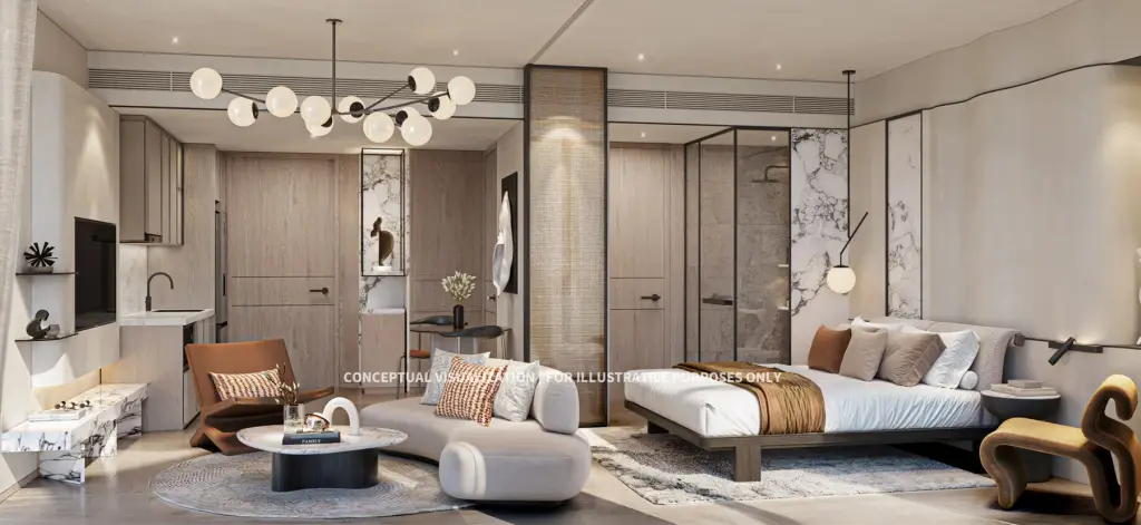 1 Bedroom Condo for Sale at Soondri Wongamat open-plan living room with bed, lounge seating and kitchenette