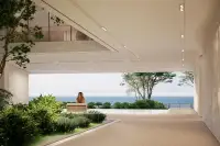 3 Bedroom House for Sale at Soondri Wongamat covered terrace with sea view and garden lounge seating