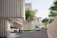 3 Bedroom House for Sale at Soondri Wongamat perforated facade entrance with covered parking and driveway