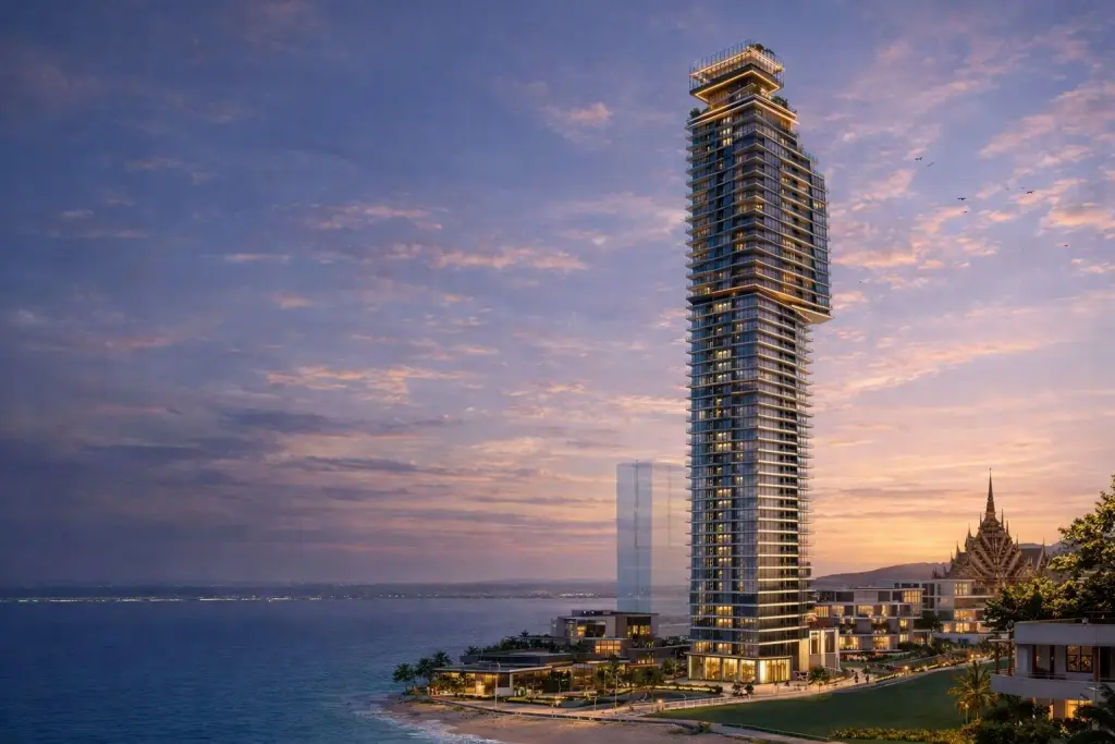 Soondri Wongamat high-rise tower on Pattaya coastline at sunset with ocean view