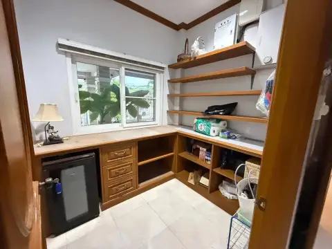6 Bedroom House for Rent at SP Village 5 pantry storage room with shelves and mini fridge