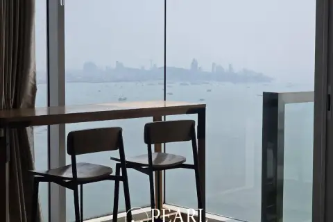 2 Bedroom Condo for Sale at Palm Wongamat master bedroom with sea view