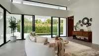 2 Bedroom House for Sale at Sunplay Bangsaray open living area with potted plant, wall decor and garden view