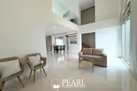 1 Bedroom Condo for Sale in The Cloud living room with sofa and TV