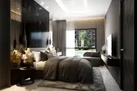 1 Bedroom Condo for Sale at Zenith 2: Bedroom with large bed, black marble headboard, and dressing table.