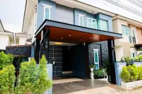 4 Bedroom House for Rent in Takhian Tia two-story modern exterior with covered carport entrance