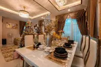 4 Bedroom House for Rent in Takhian Tia elegant dining table set with gold accents and holiday decor