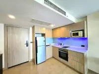 1 Bedroom Condo for Sale at The Cliff modern kitchen with blue LED backsplash, oven and fridge