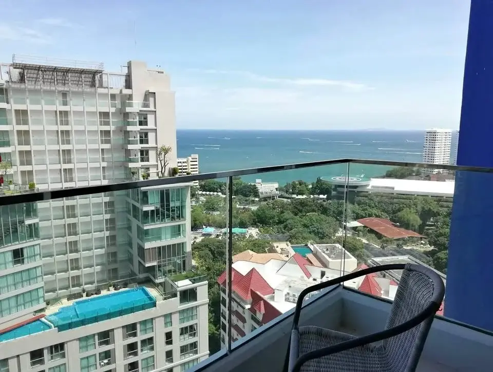 1 Bedroom Condo for Sale at The Cliff balcony view overlooking Pattaya high-rises, pools and the sea