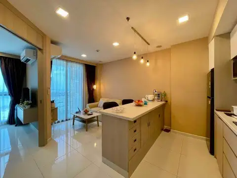 1 Bedroom Condo for Sale at The Cloud kitchen island overlooking living room with city view window