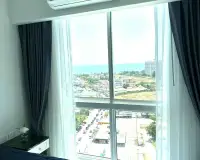 1 Bedroom Condo for Rent at The Empire Tower Pattaya window view overlooking city streets and coastline