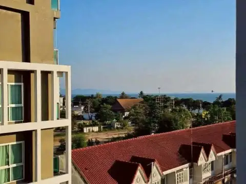 1 Bedroom Condo for Rent at The Gallery Condominium balcony view of sea horizon and rooftops in Pattaya