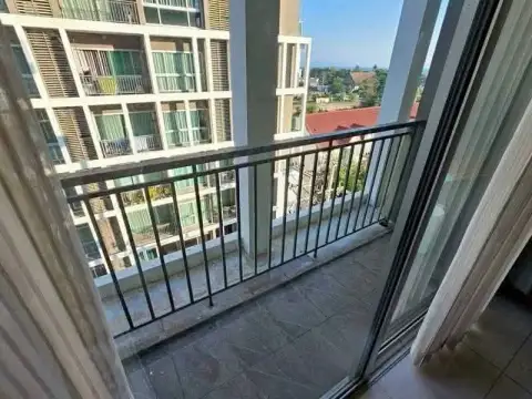 1 Bedroom Condo for Rent at The Gallery Condominium private balcony with railing and tiled flooring