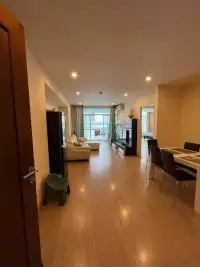 2 Bedroom Condo for Sale at The Ocean Pearl hallway view of living room with balcony and dining table